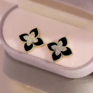 Black and Gold Floral Earrings – Sparkling Four-Leaf Studs with Cubic Zirconia (PJT-991)