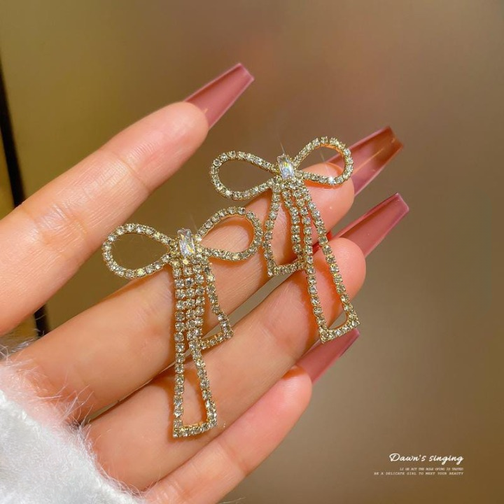 PQT-985 Touch Of Glamour To Your Look With These Bow Shape Zircon Korean Earrings – Color Golden